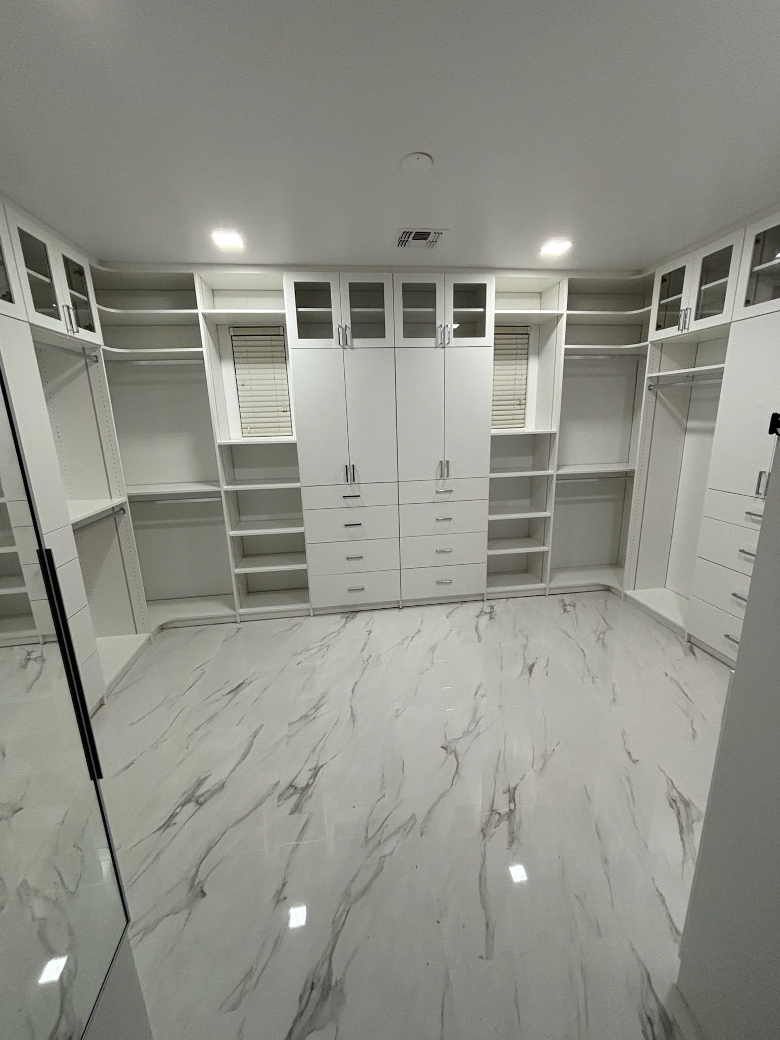 Custom walk-in closet installed by Up Closets of Mesa